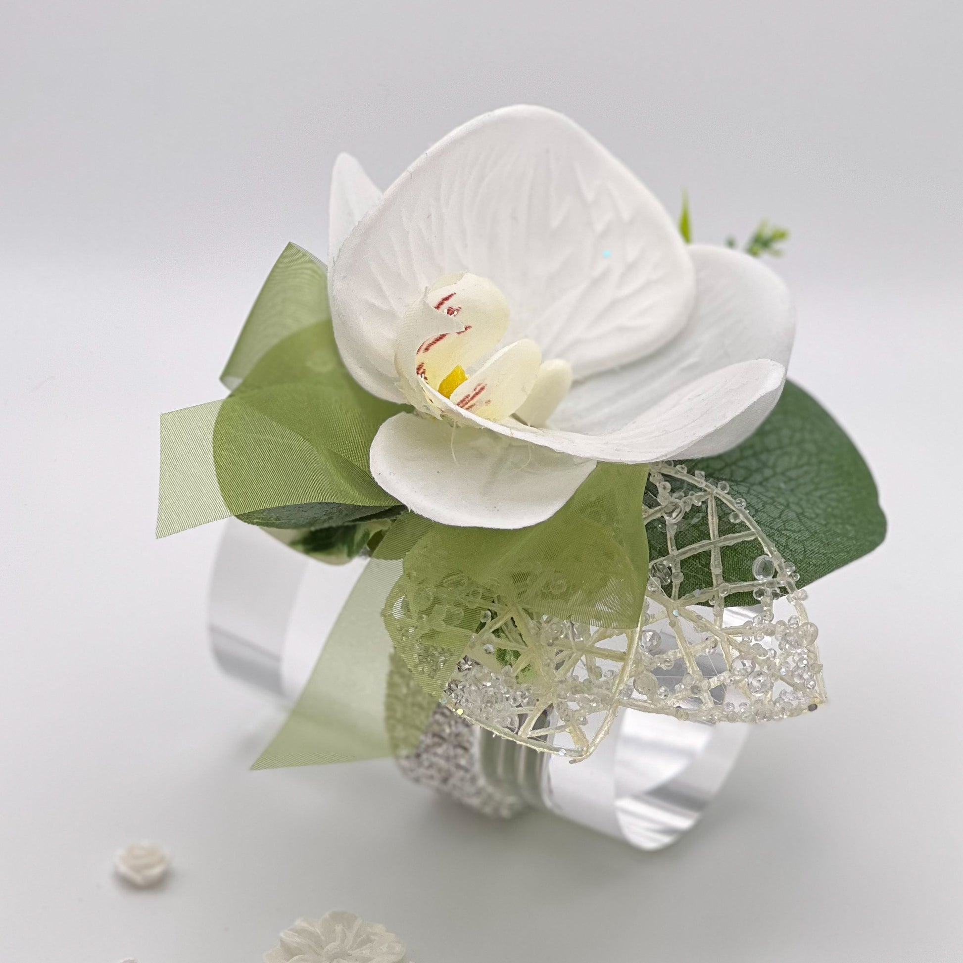 White Orchid with Sage Green Debs Corsage 1