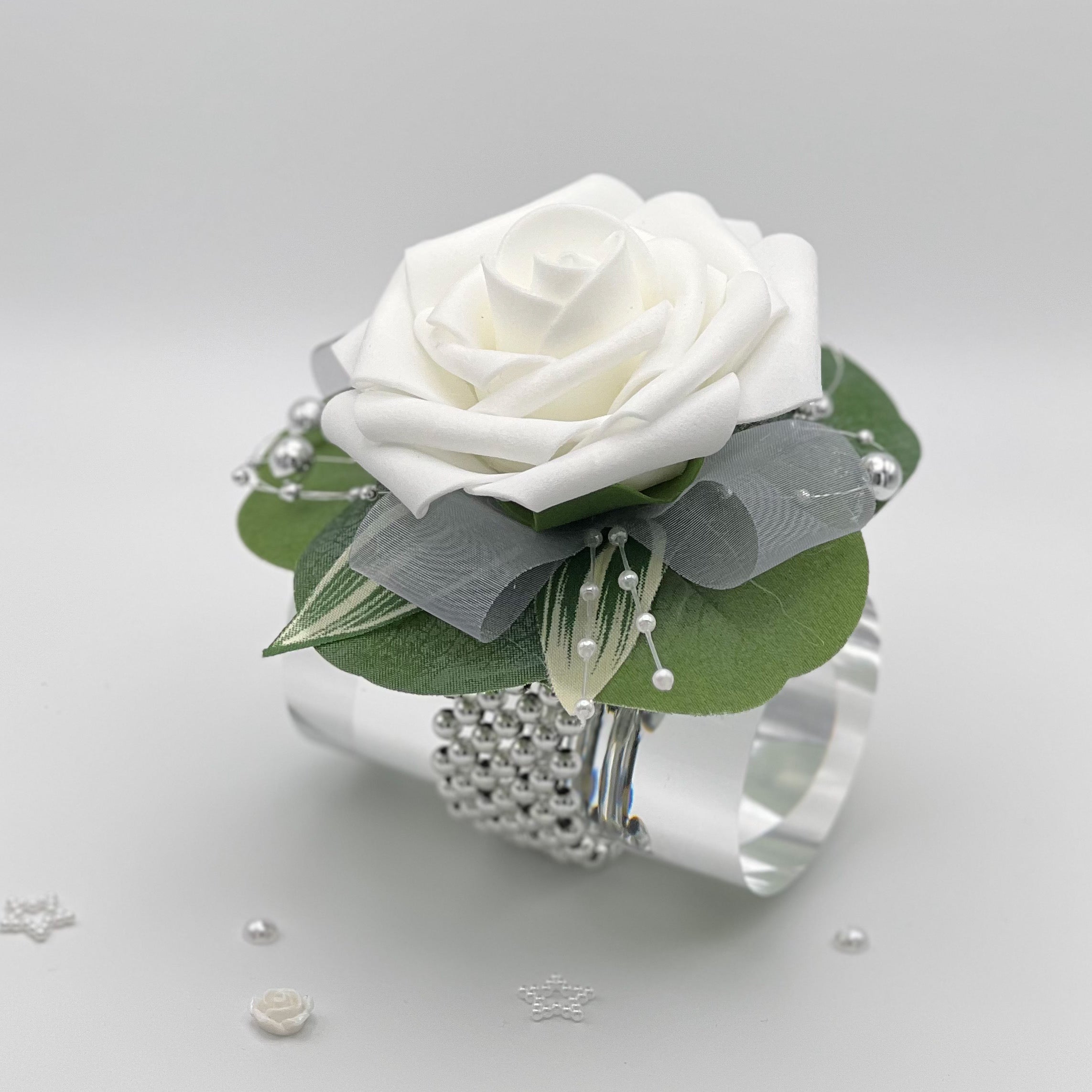 White and silver store corsage
